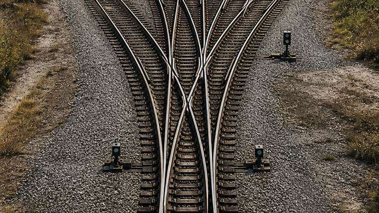 Railway tracks branching from one central junction